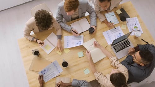 Group Of People Having A Meeting