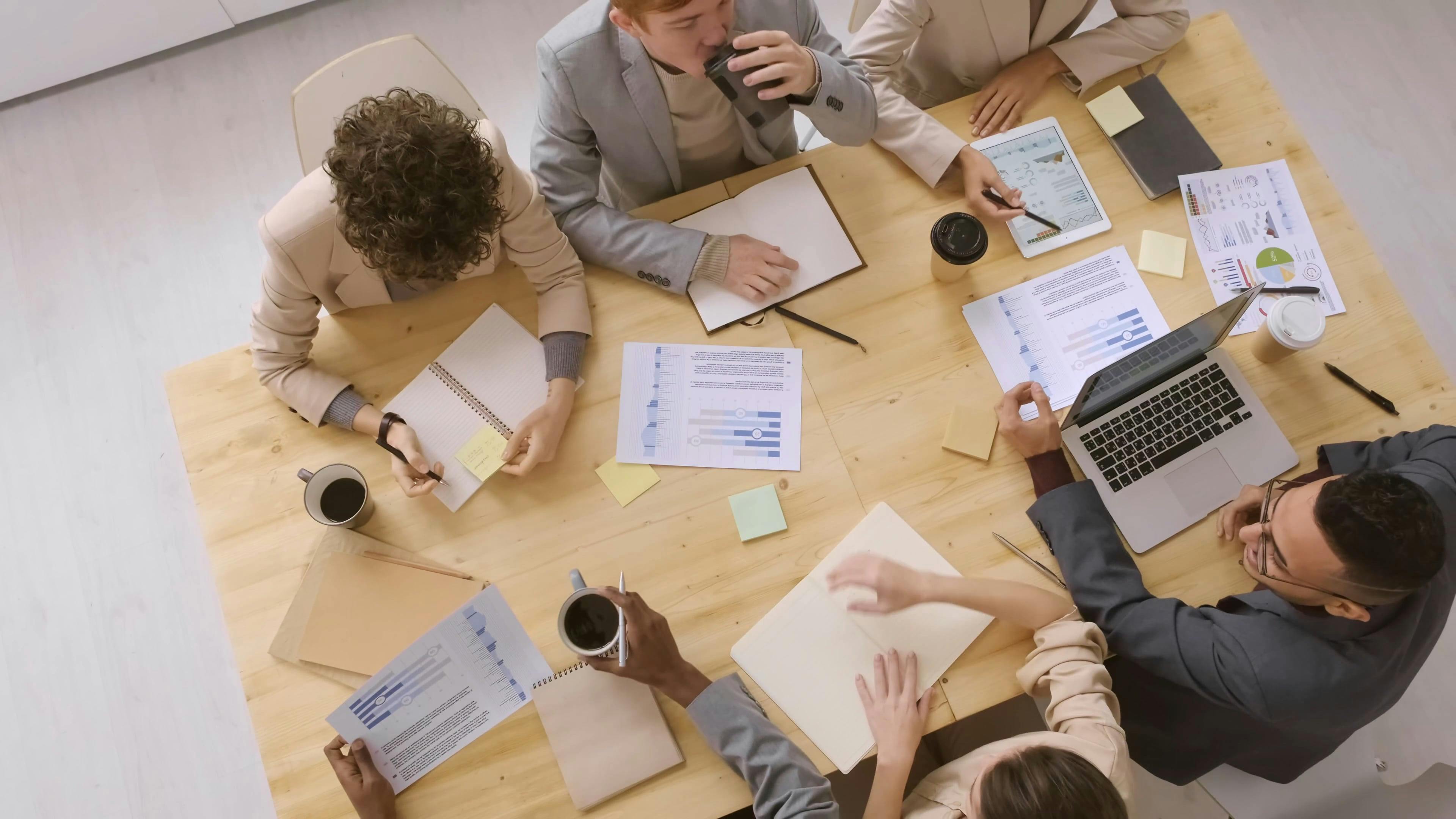 A Group Of People Discussing In A Meeting · Free Stock Video