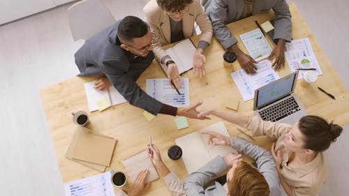 Group Of People Having A Meeting