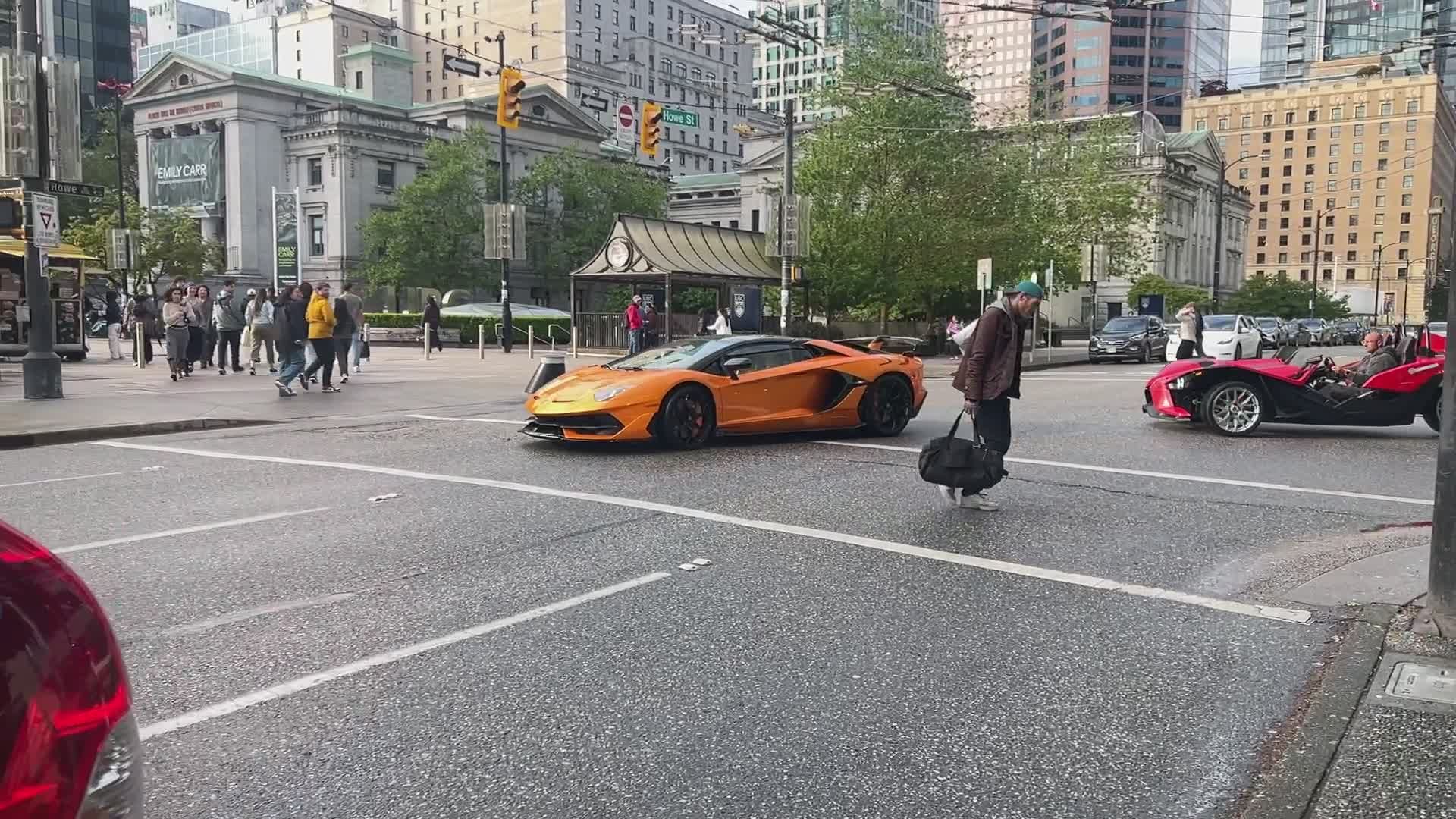 Luxury Sports Car in Vibrant City Intersection Free Stock Video Footage ...