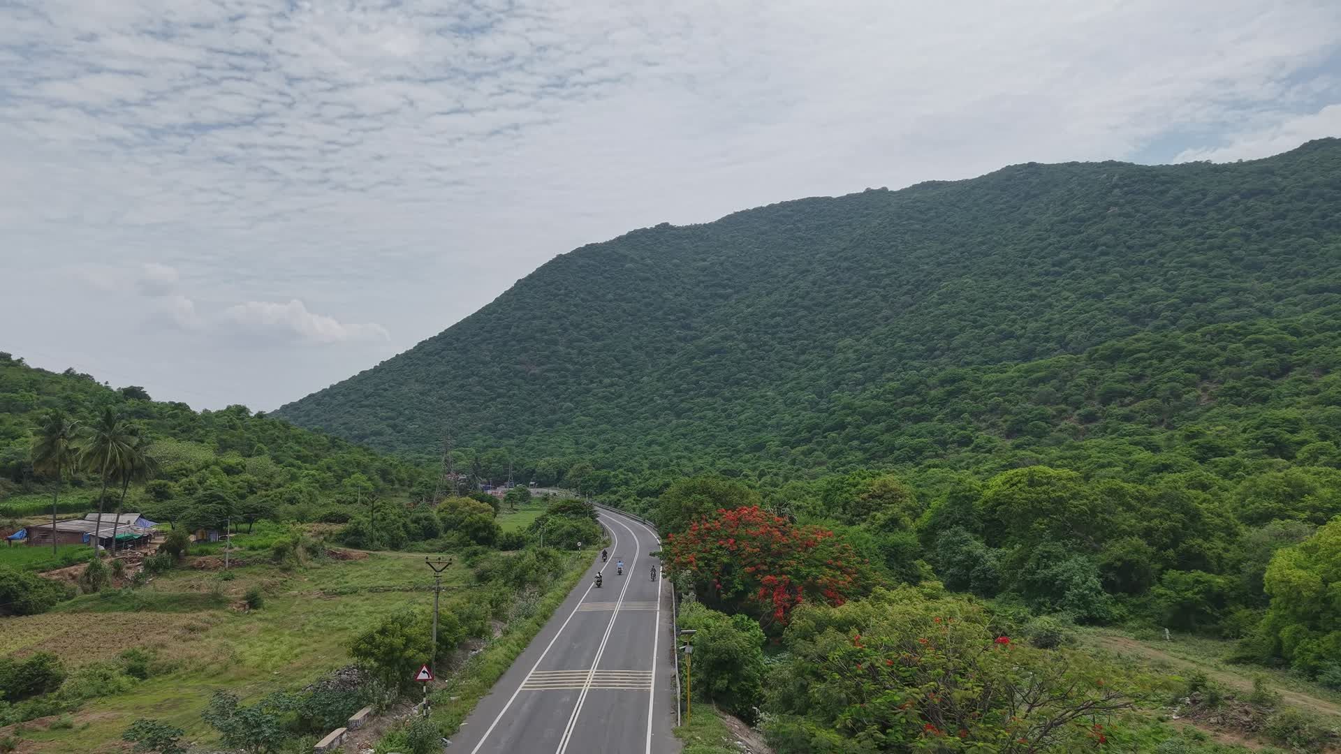 Scenic Aerial View of Lush Green Mountain Road Free Stock Video Footage ...