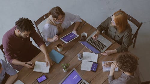 Group Of People Having A Meeting