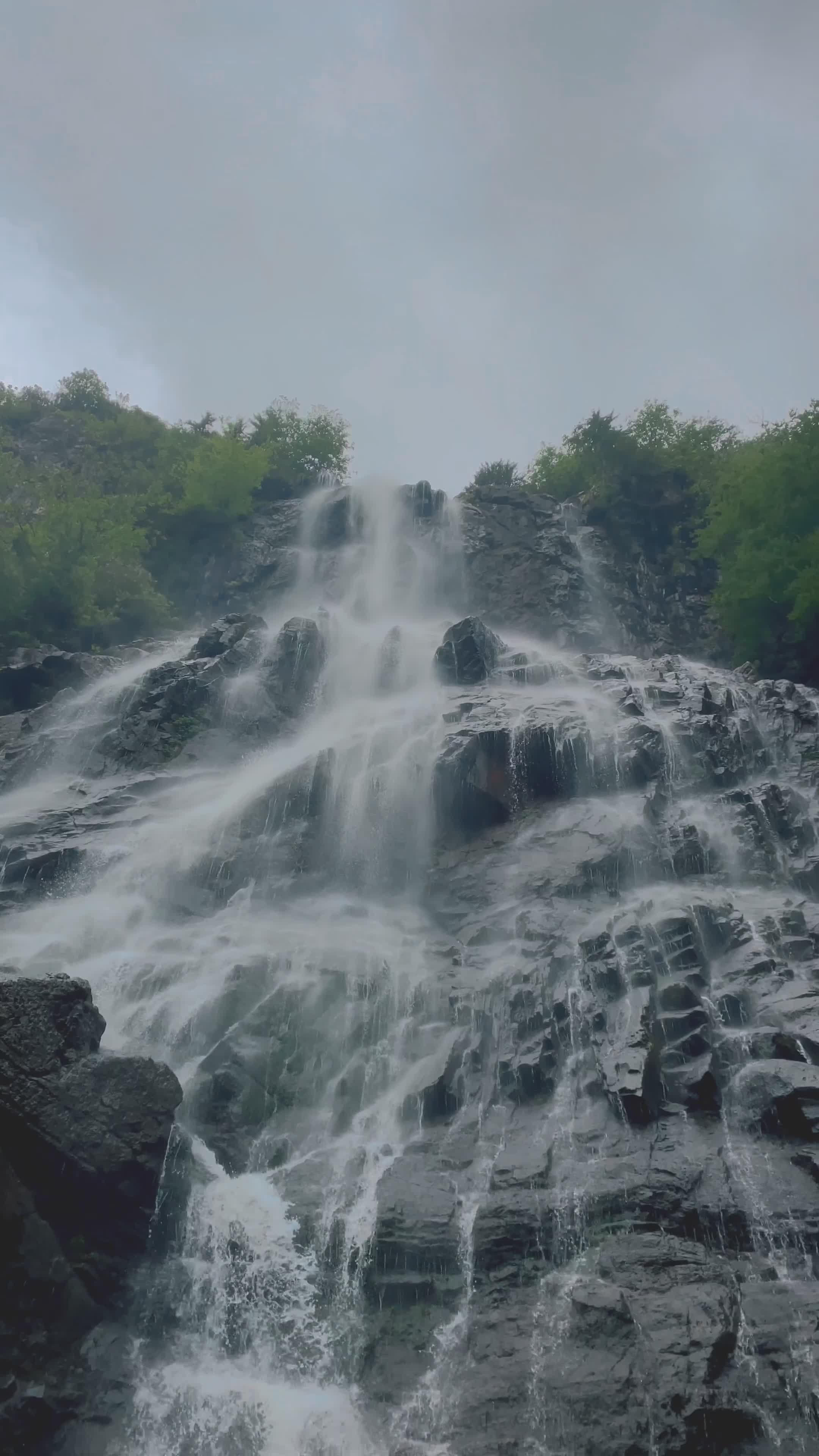 A waterfall is shown in this photo Free Stock Video Footage, Royalty ...