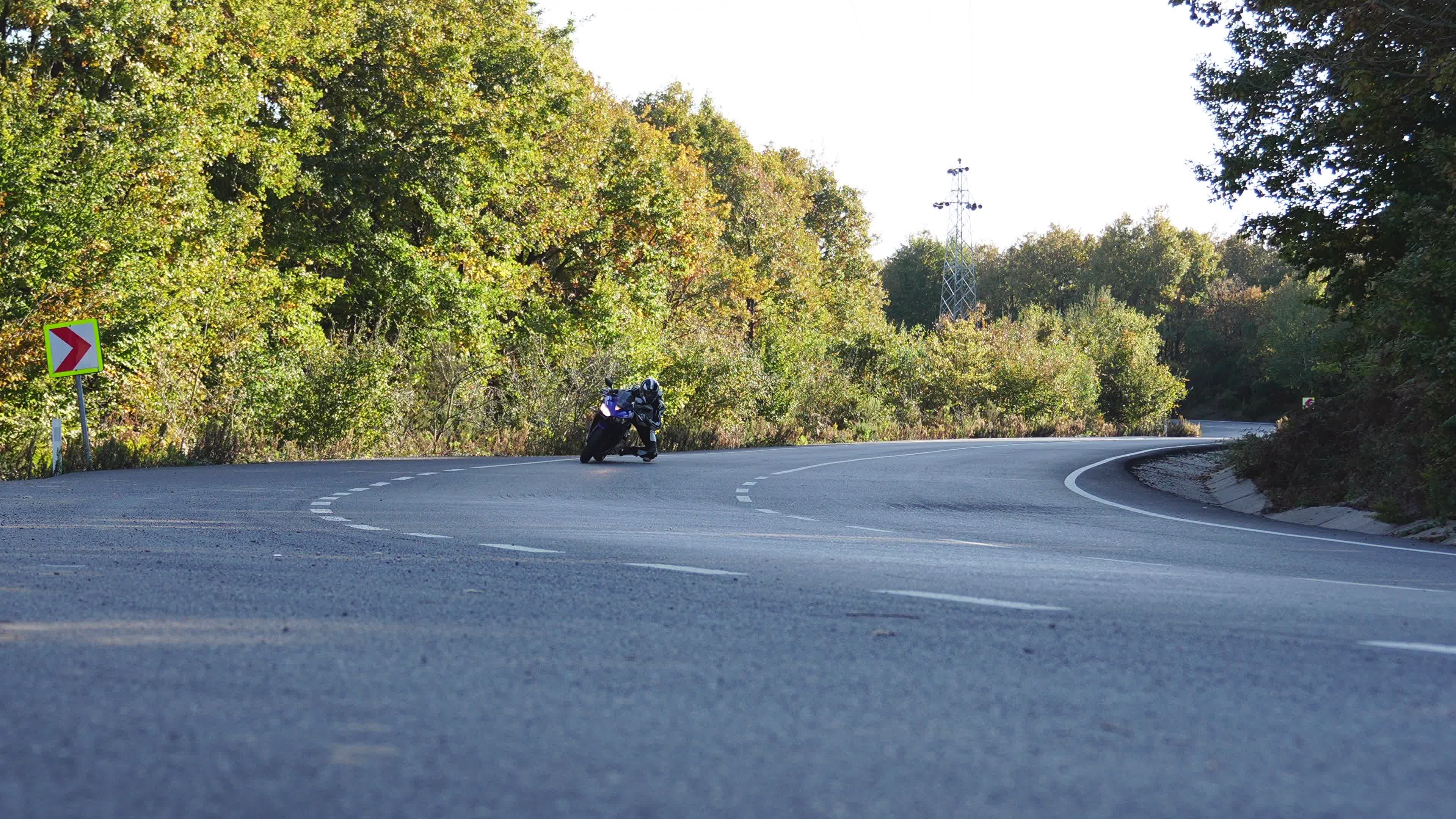 Motorbike Takes Sharp Turn on Forest Road Free Stock Video Footage ...