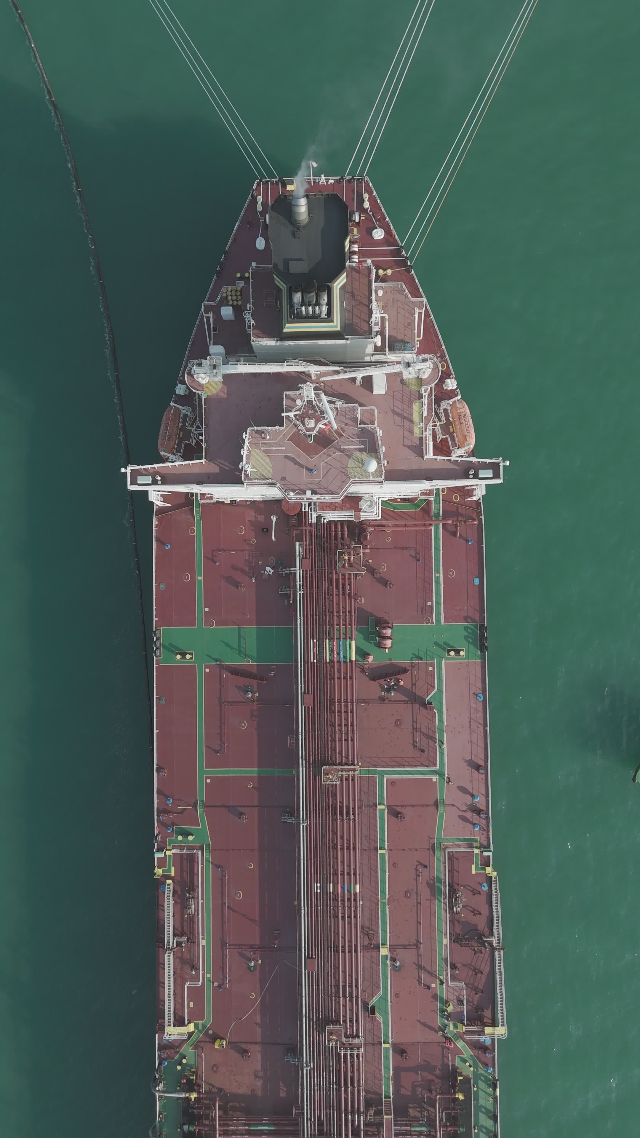 Aerial View of Cargo Ship Navigating Calm Waters Free Stock Video ...