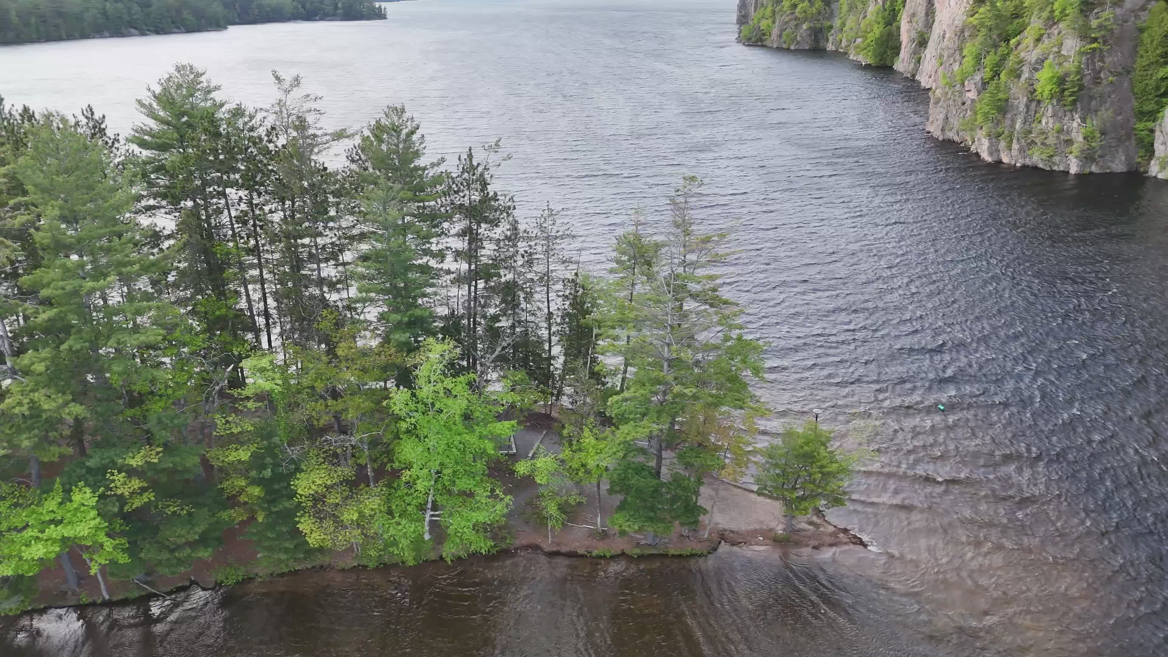 Serene Aerial View of Forested Lakeside Landscape Free Stock Video ...