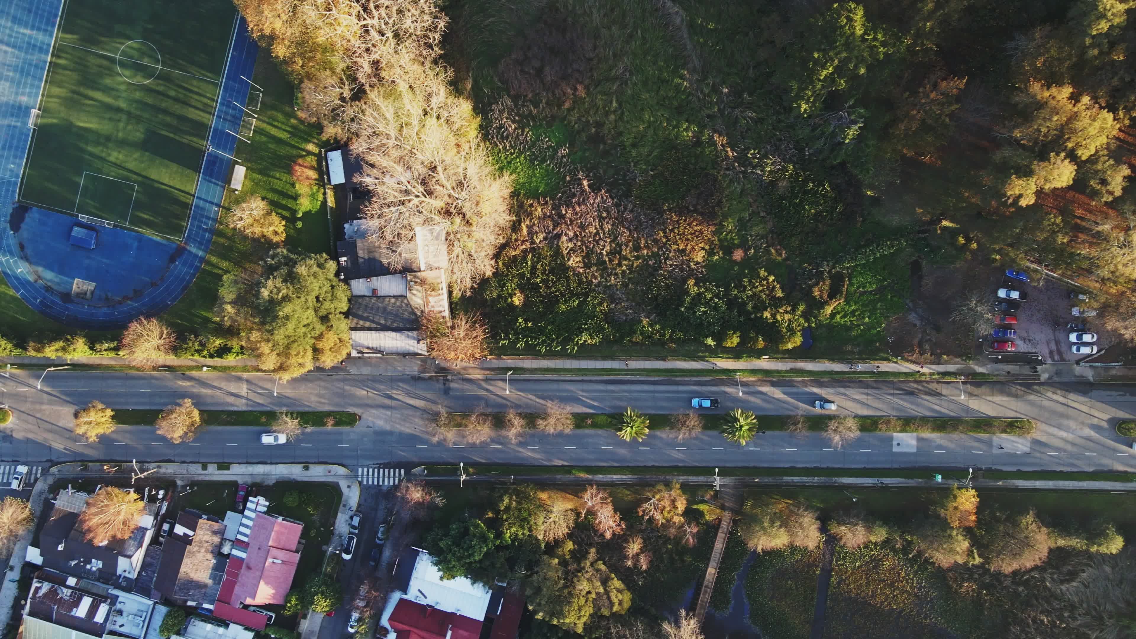 Aerial View of Urban Green Space and Roads Free Stock Video Footage ...
