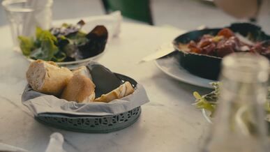 outdoor dining with fresh bread and salad