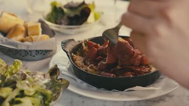 delicious dinner with prosciutto in a skillet