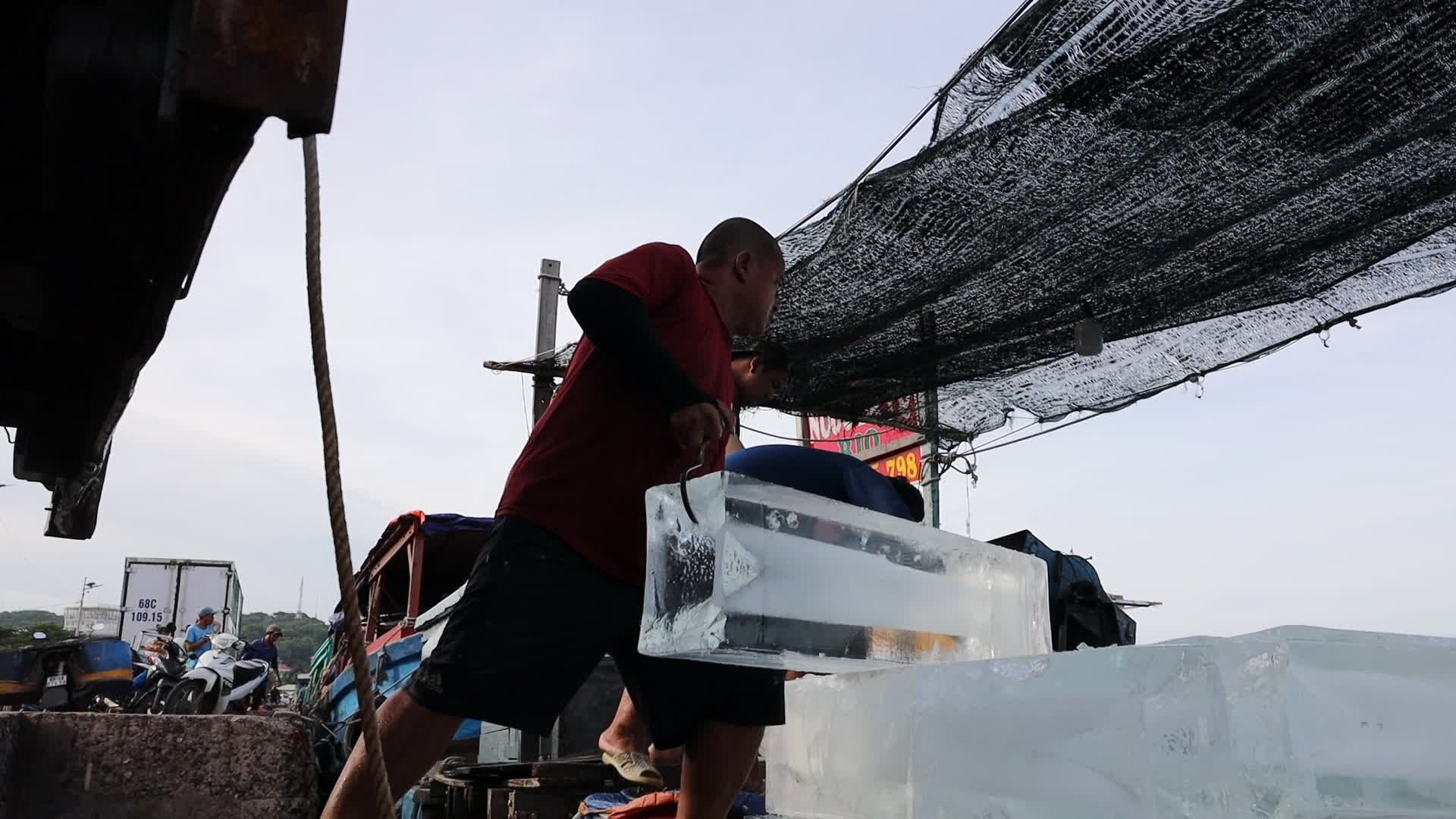 Men Transporting Ice Blocks at Outdoor Market Free Stock Video Footage ...