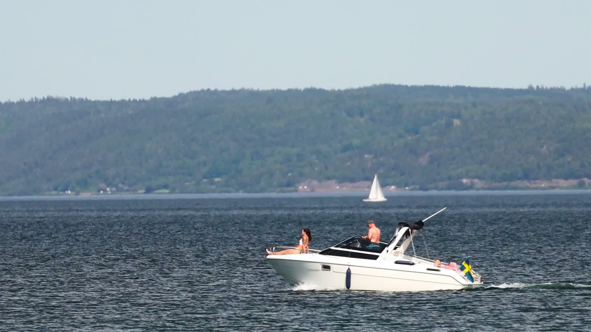Sleek Motorboat Navigating Serene Lake Waters Free Stock Video Footage ...