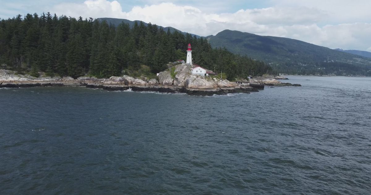 aerial view of lighthouse on rocky coastline 32746556 — free pexels stock footage