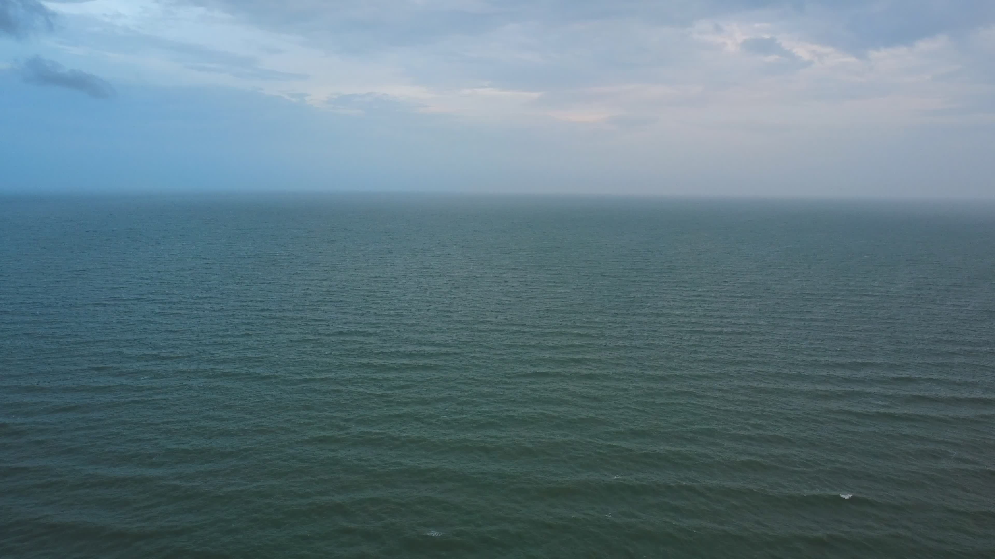 Serene Aerial View of Calm Ocean at Twilight Free Stock Video Footage ...