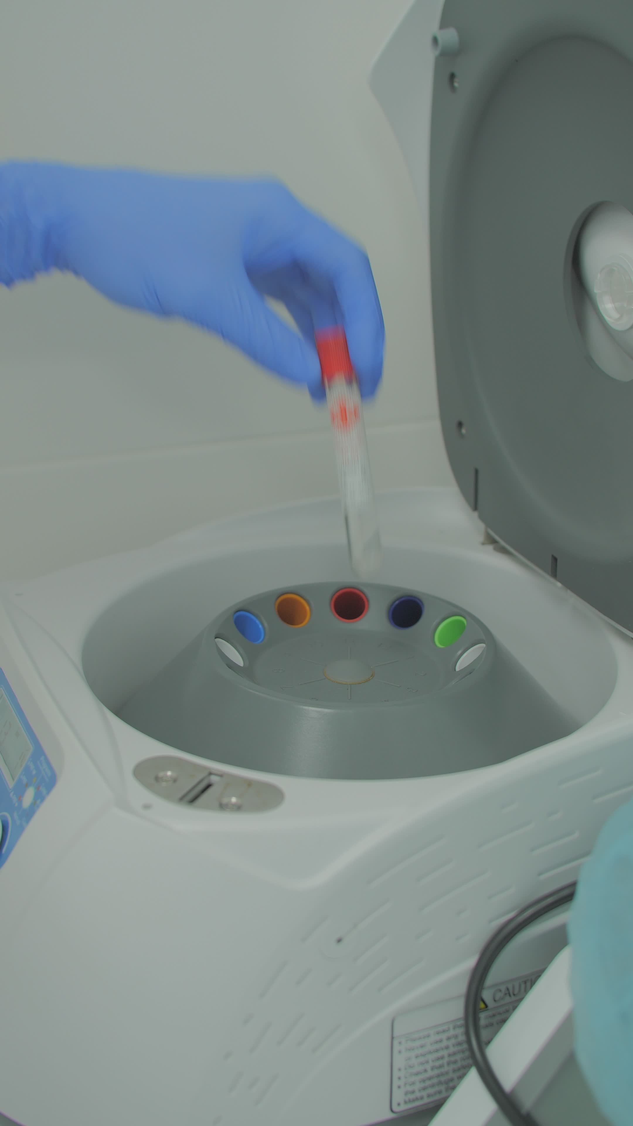 Lab Technician Handling Blood Samples in Centrifuge Free Stock Video ...
