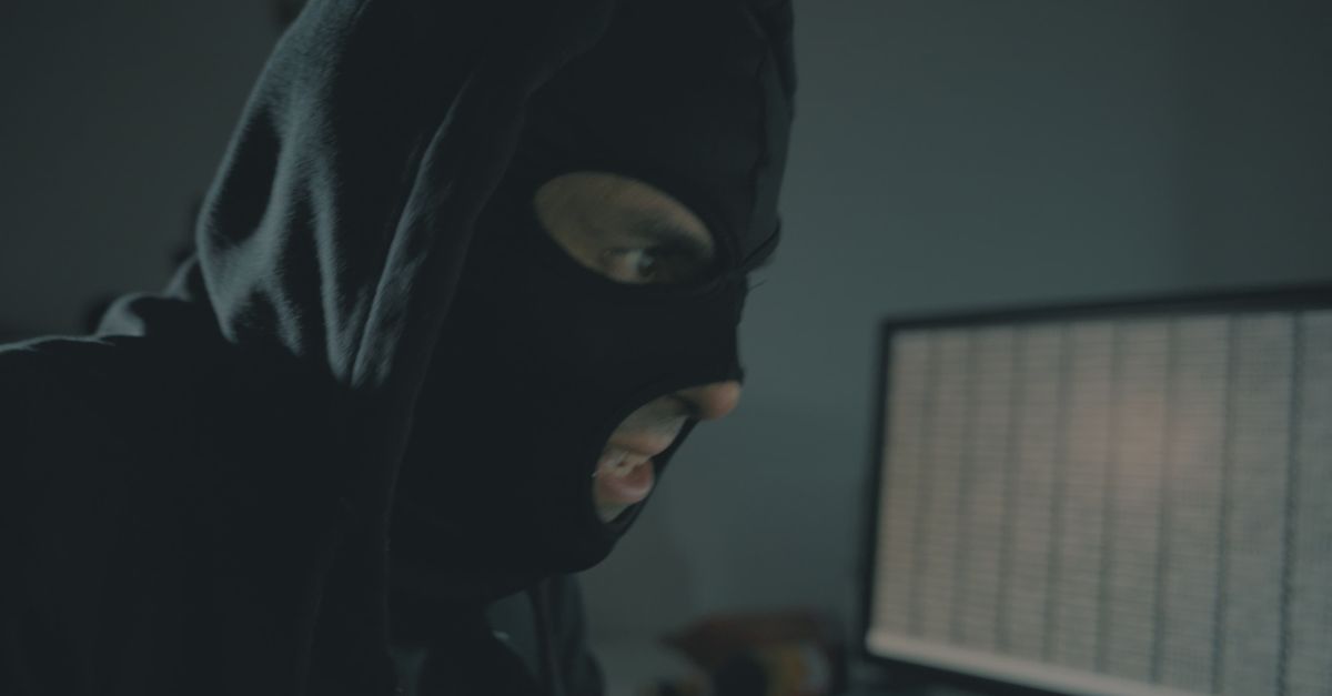 Computing Hacking Screen Masked Hacker Typing on Computer Keyboard Free Stock Video Footage ...