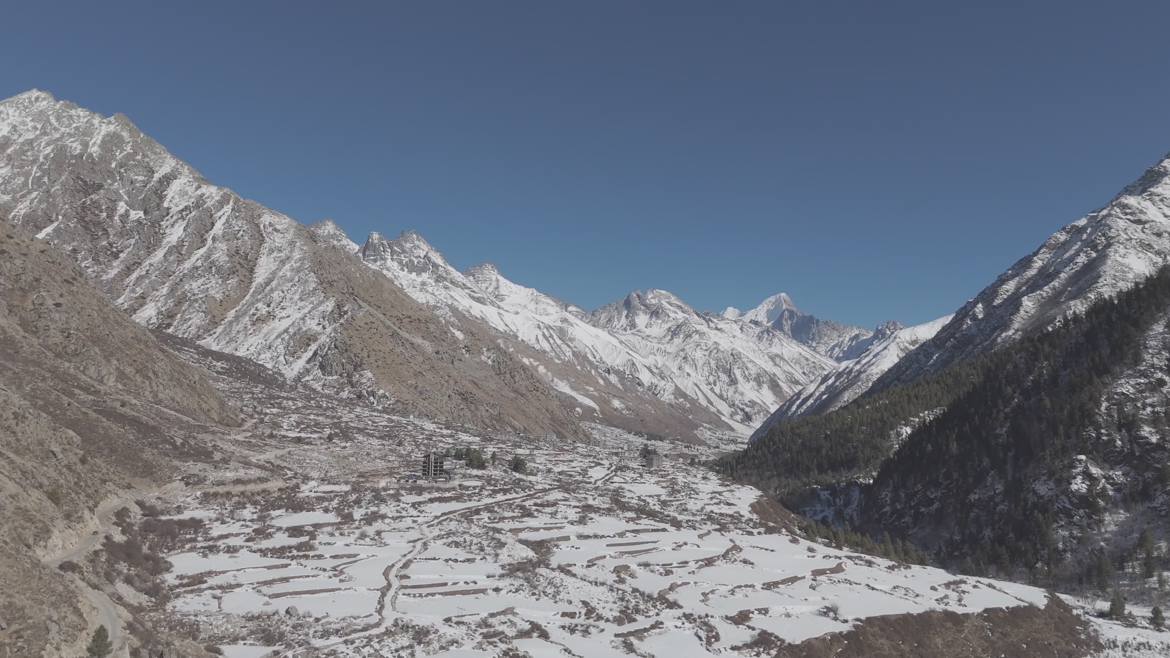Stunning Aerial View of Snowy Mountains in Winter Free Stock Video ...