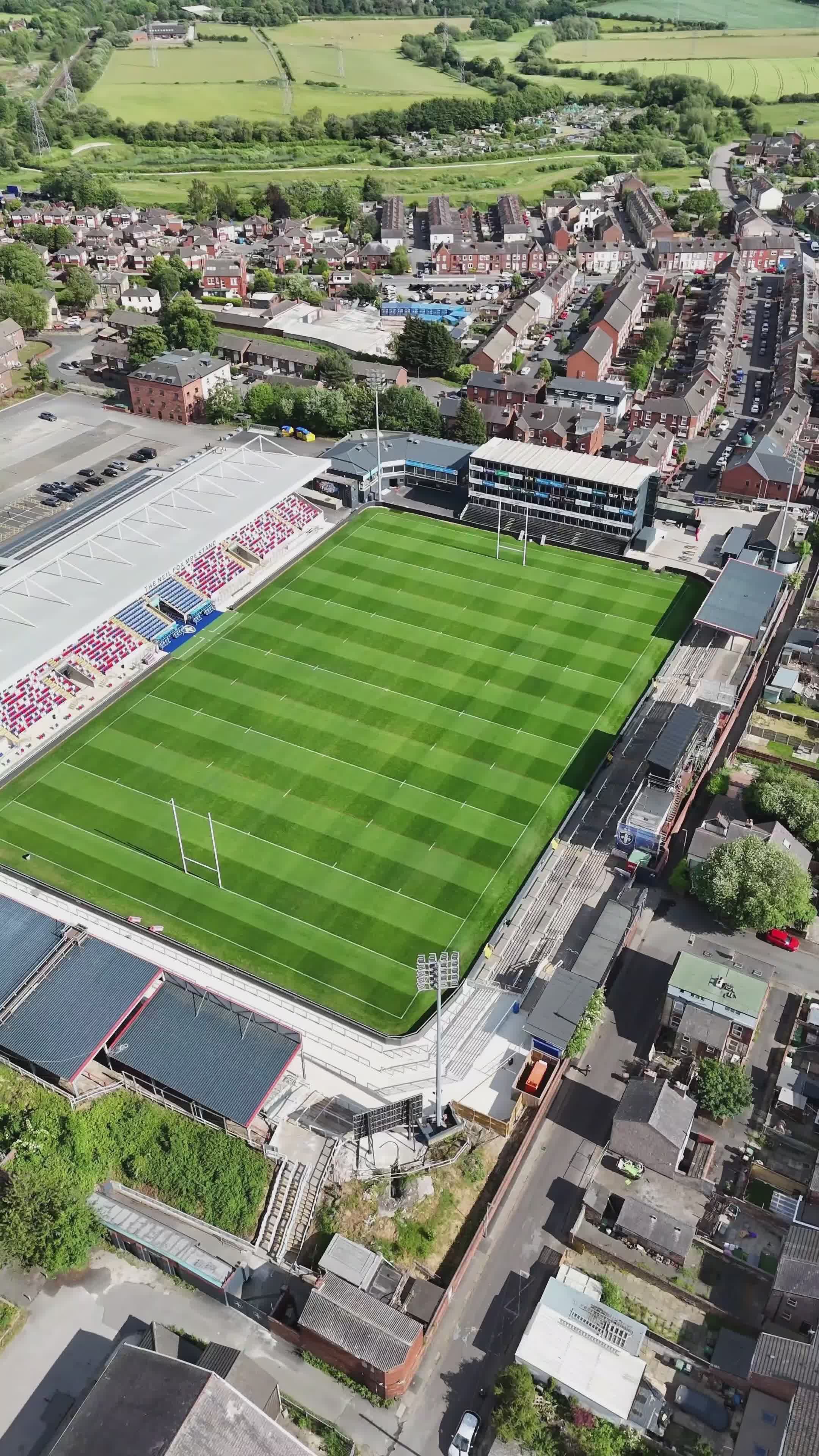 Aerial View of Football Stadium in Lush Landscape Free Stock Video ...