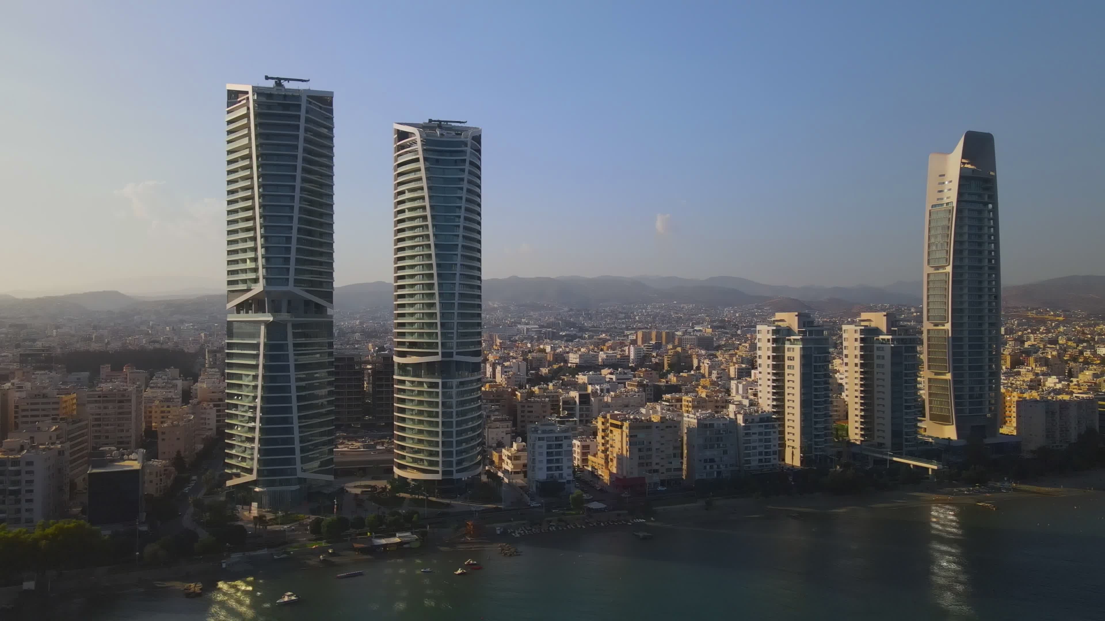Drone Aerial View of Modern Coastal City Skyline Free Stock Video ...