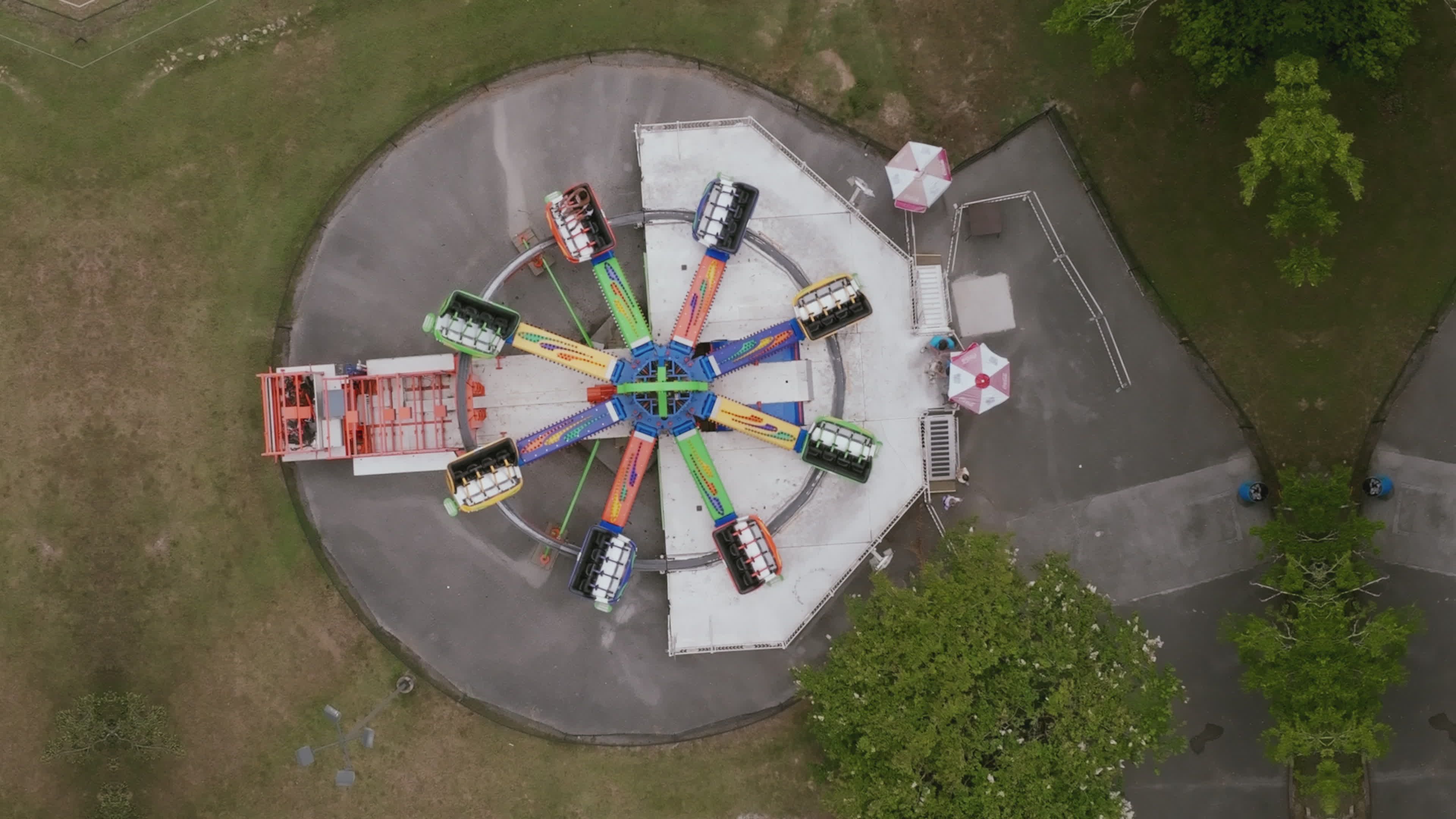 Aerial View of Colorful Amusement Park Ride Free Stock Video Footage ...