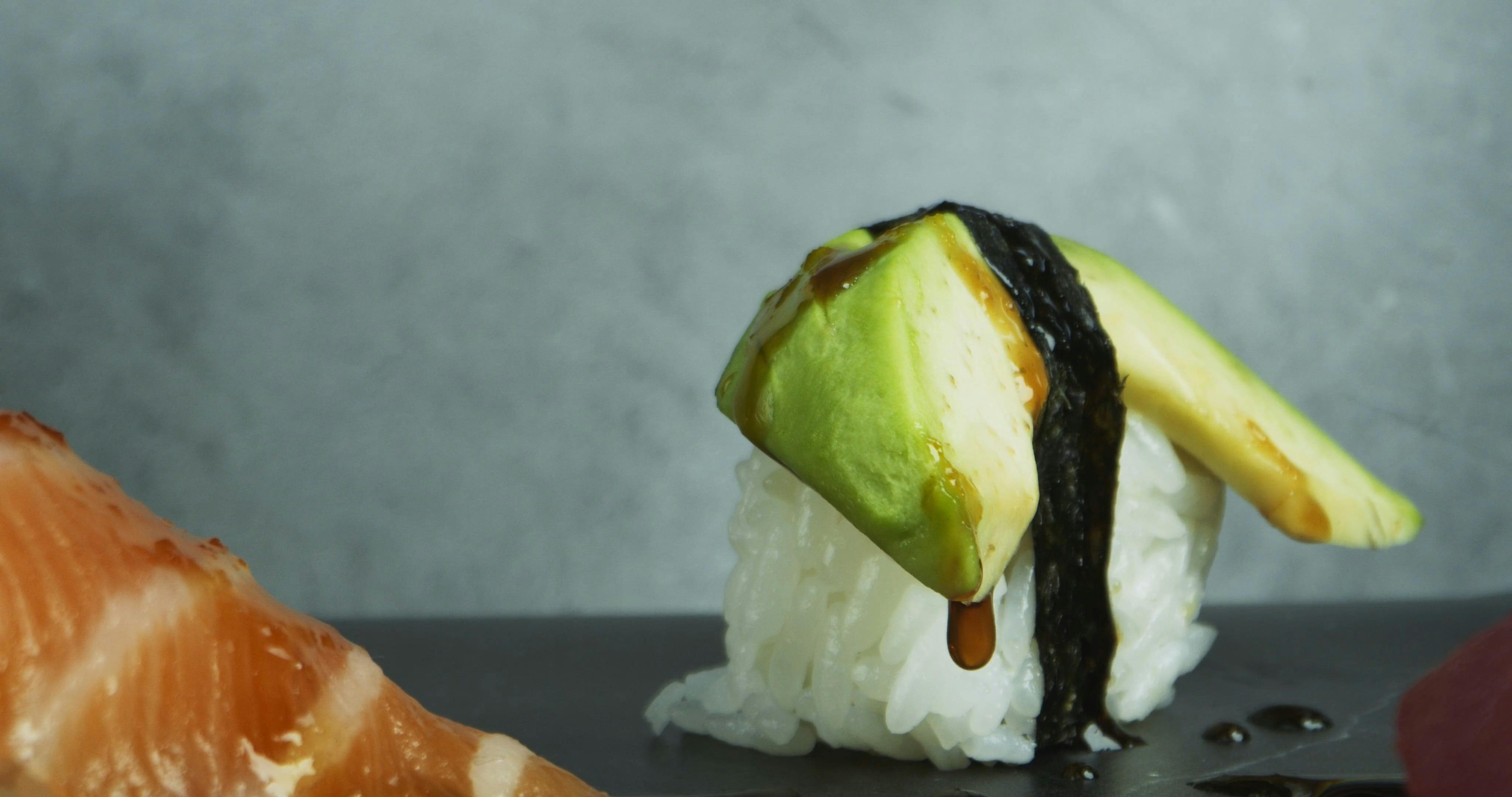 Sprinkle Of Sesame Seeds On Mixed Sushi · Free Stock Video