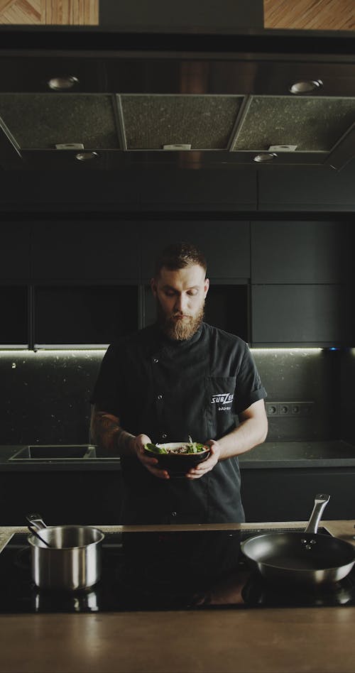 A Chef Break In Laughter While Having A Japanese Noodle Soup Dish On Hand