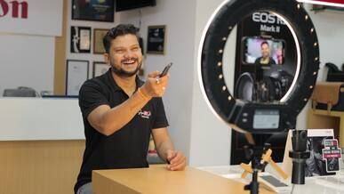Creator recording an on-camera studio presentation