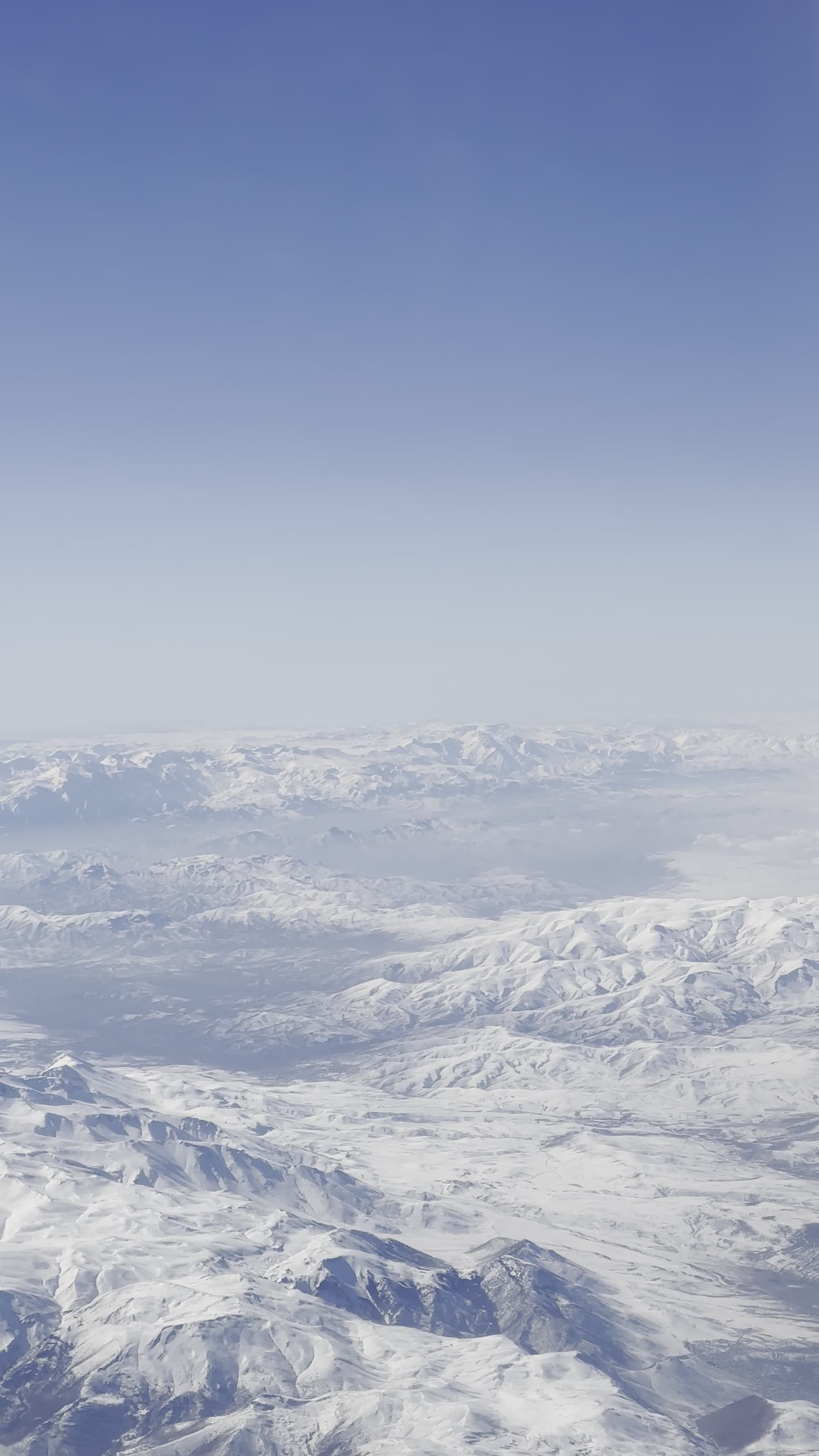 bird s eye view of snow covered mountain range 33087319 — free pexels stock footage