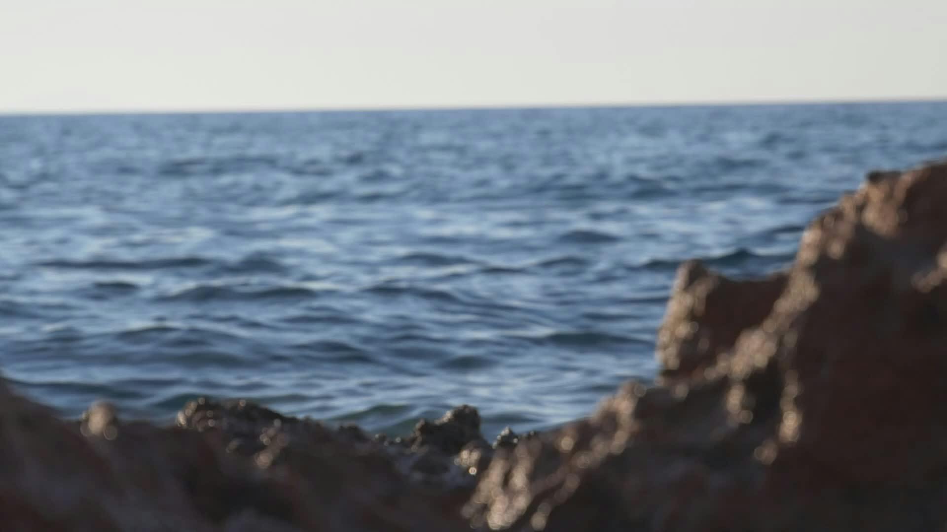 dramatic ocean waves crashing on rocky shoreline 33091589