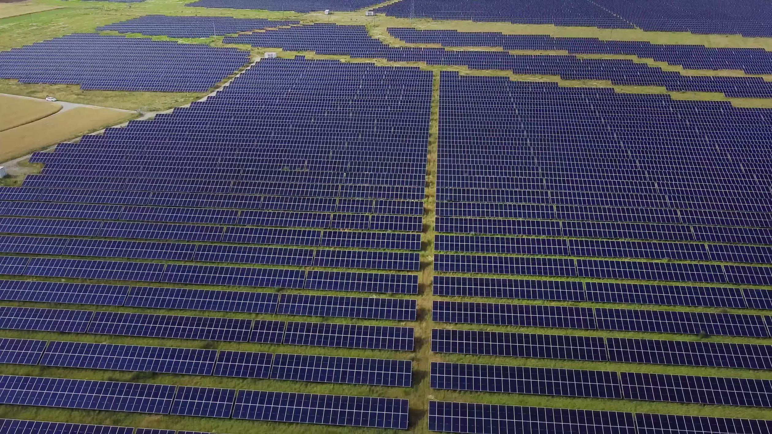 Aerial View of Expansive Solar Panel Farm Free Stock Video Footage ...