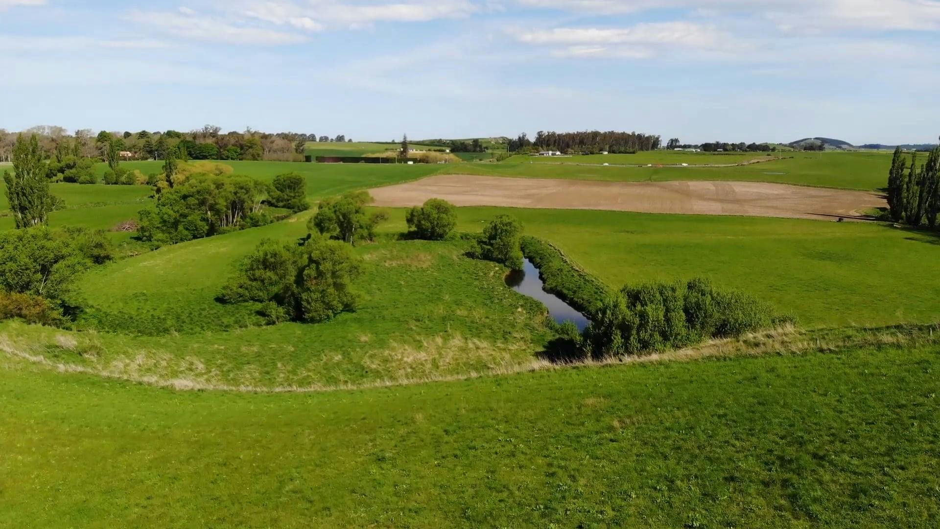 A Vast Land Of Grass And Fields · Free Stock Video