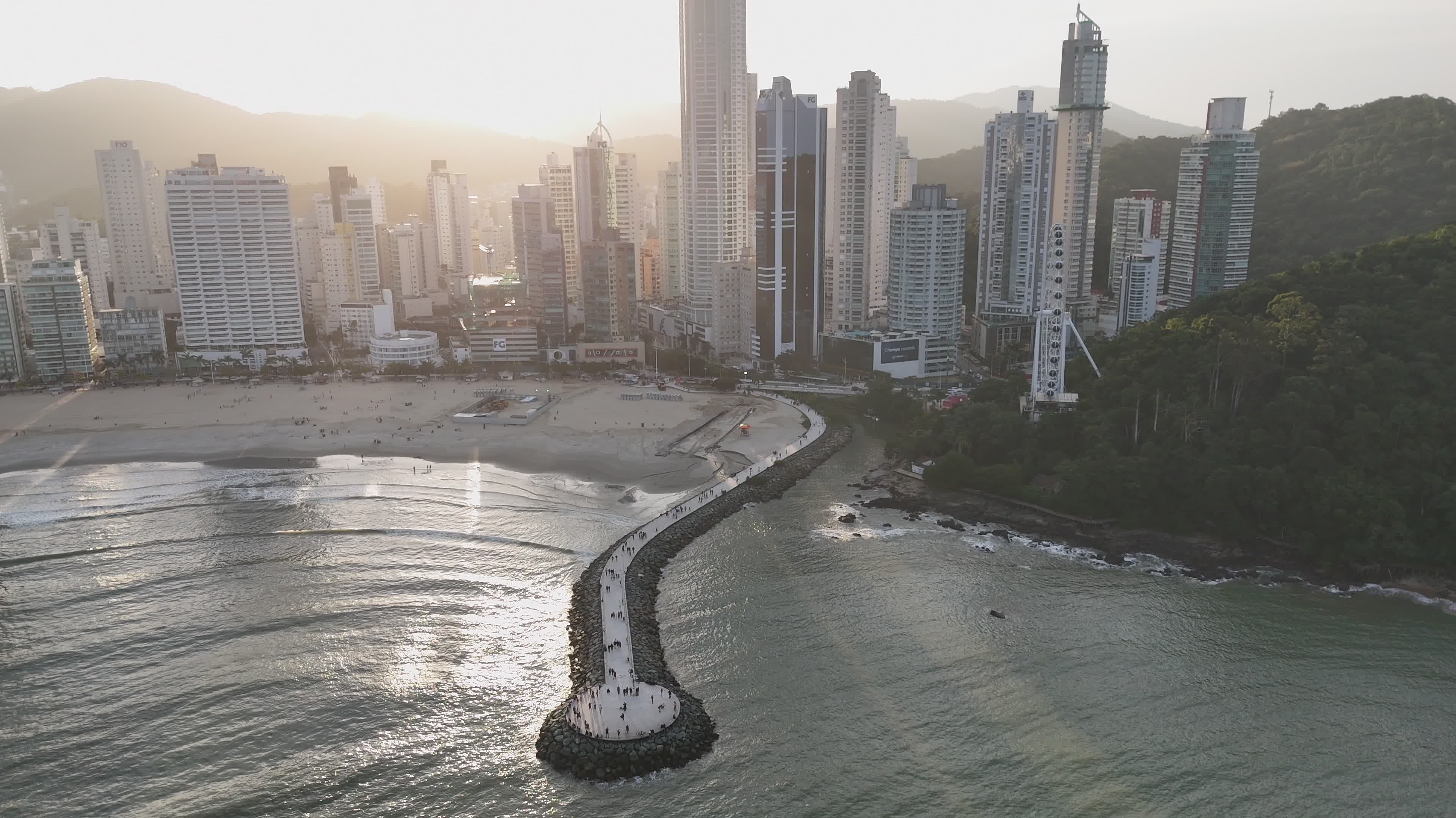 Aerial View of Coastal City Skyline at Sunset Free Stock Video Footage ...