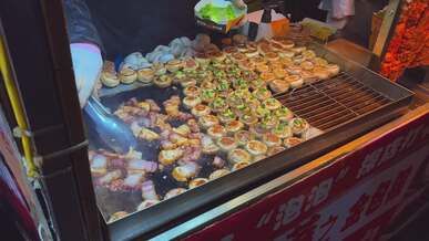 vibrant street food scene at hangzhou market