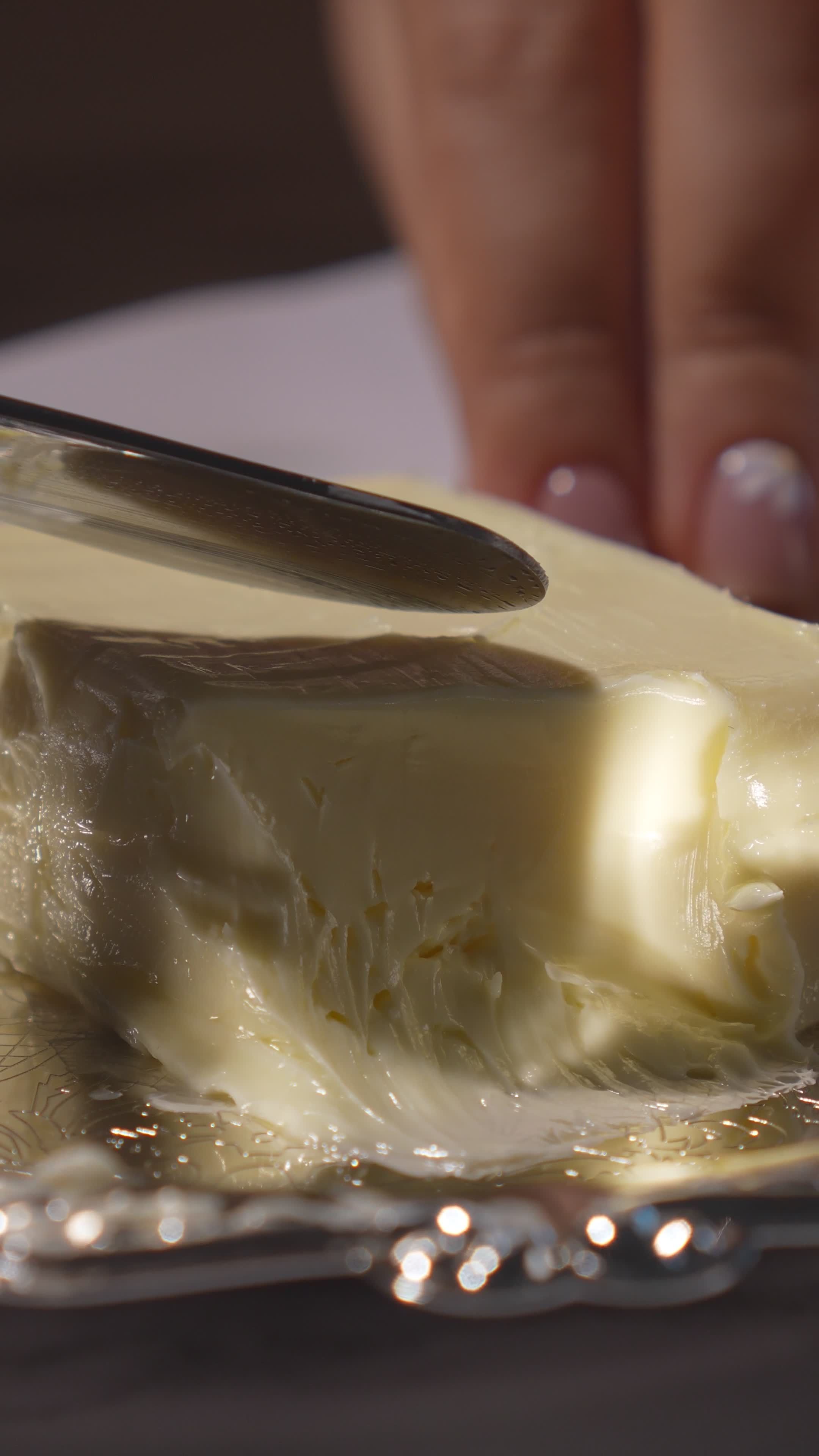 Close-Up of Butter Being Sliced Smoothly Free Stock Video Footage ...