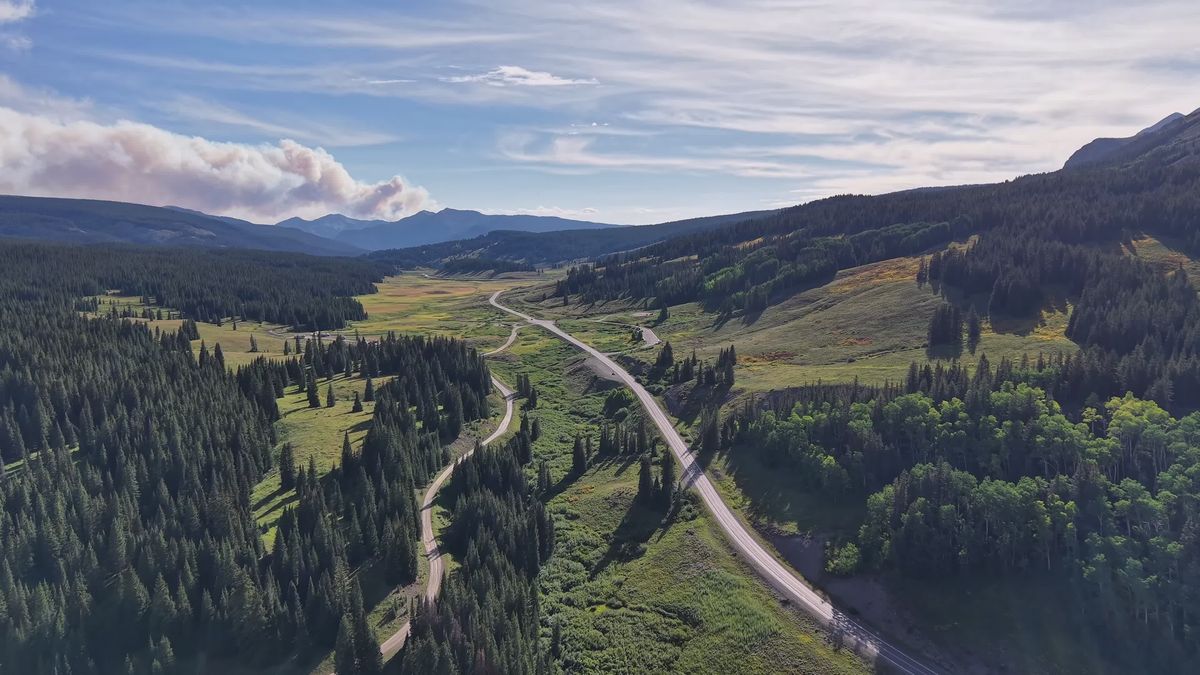 Aerial View of a Road in a Mountain Landscape Free Stock Video Footage ...