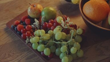 vibrant display of fresh fruits on wooden table