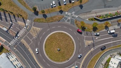 Aerial view of fast cars on a roundabout Free Stock Video Footage ...