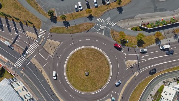 Aerial view of fast cars on a roundabout Free Stock Video Footage ...