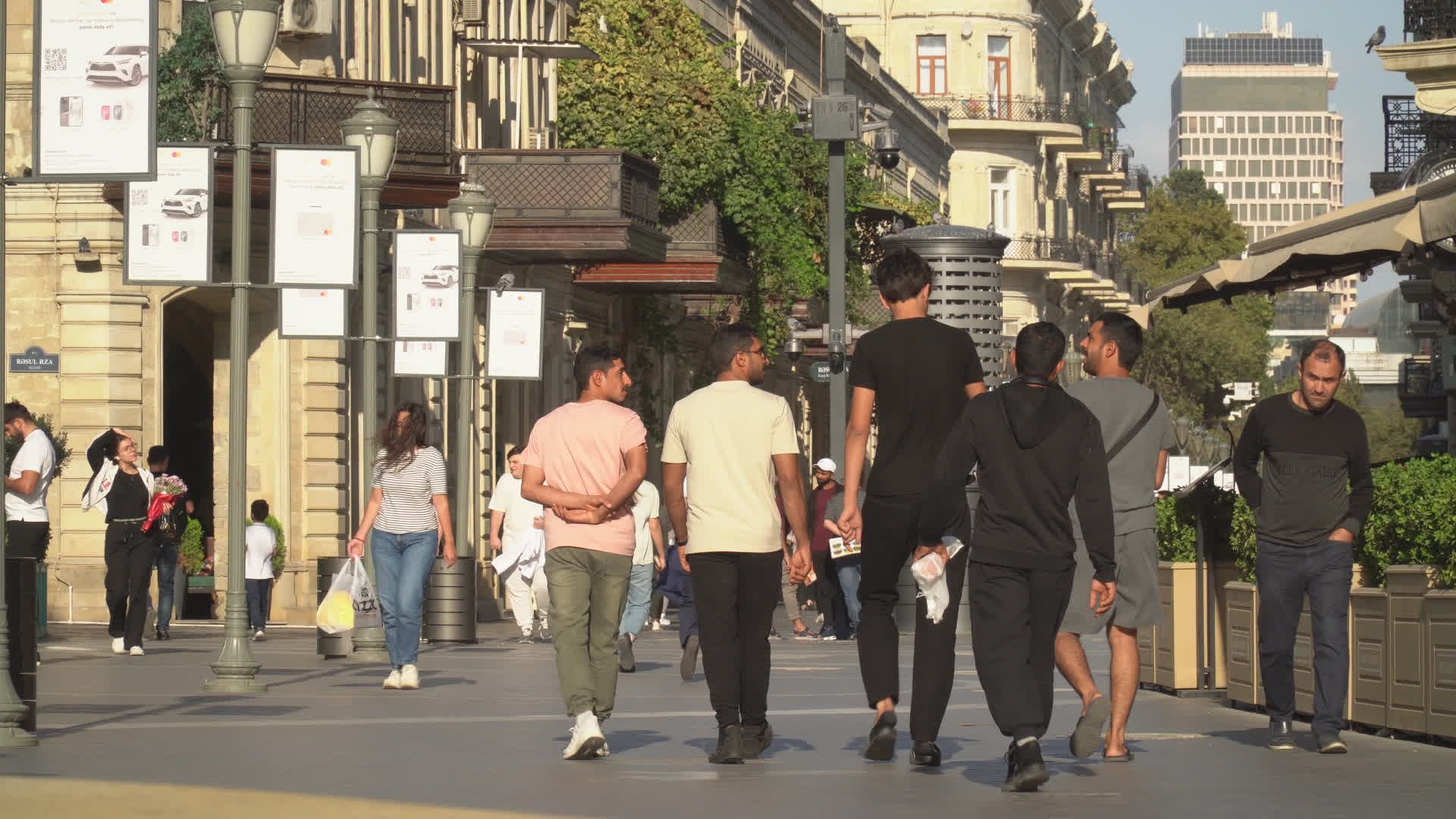casual stroll on bustling urban street 33578345