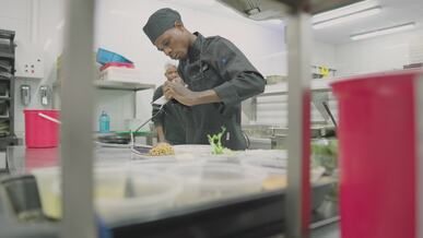 professional chef skillfully prepares delicious dish