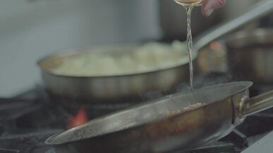 dynamic culinary flames in professional kitchen