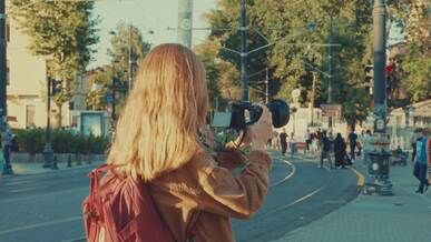 bustling city photography scene with cameraperson