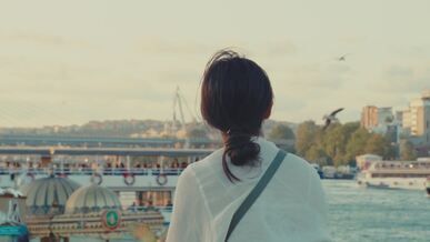 scenic river view with boats and city skyline
