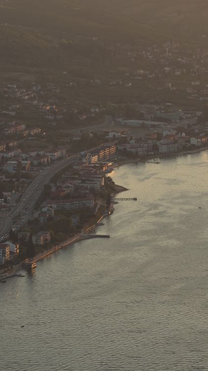 Scenic Aerial View of Coastal Town at Sunset Free Stock Video Footage ...