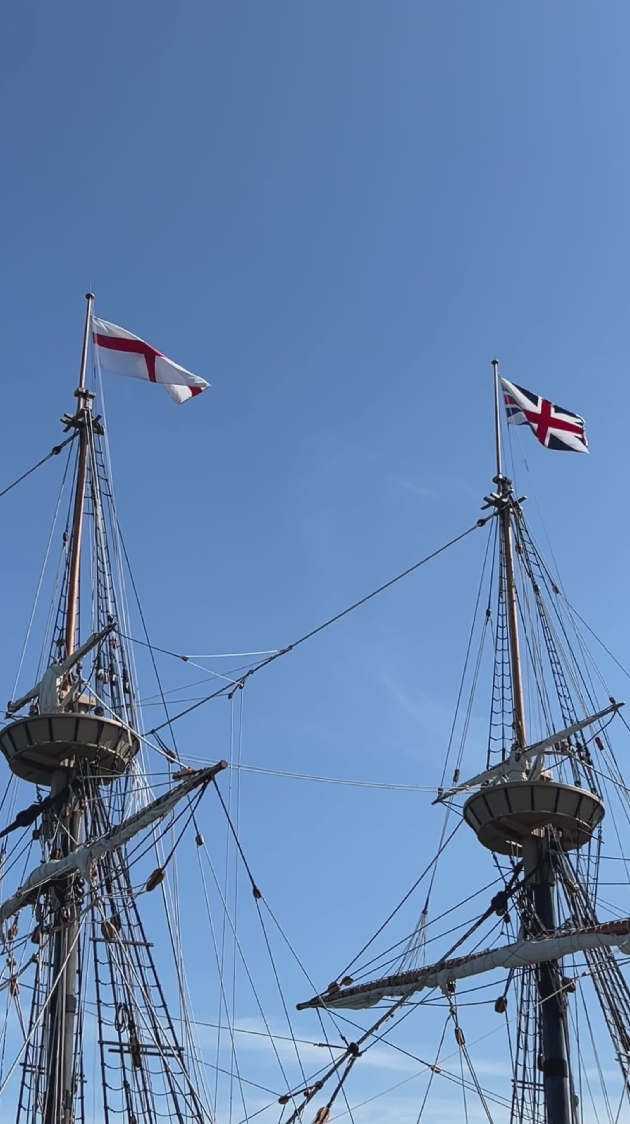 Historic Ship Masts with Flags Against Blue Sky Free Stock Video ...