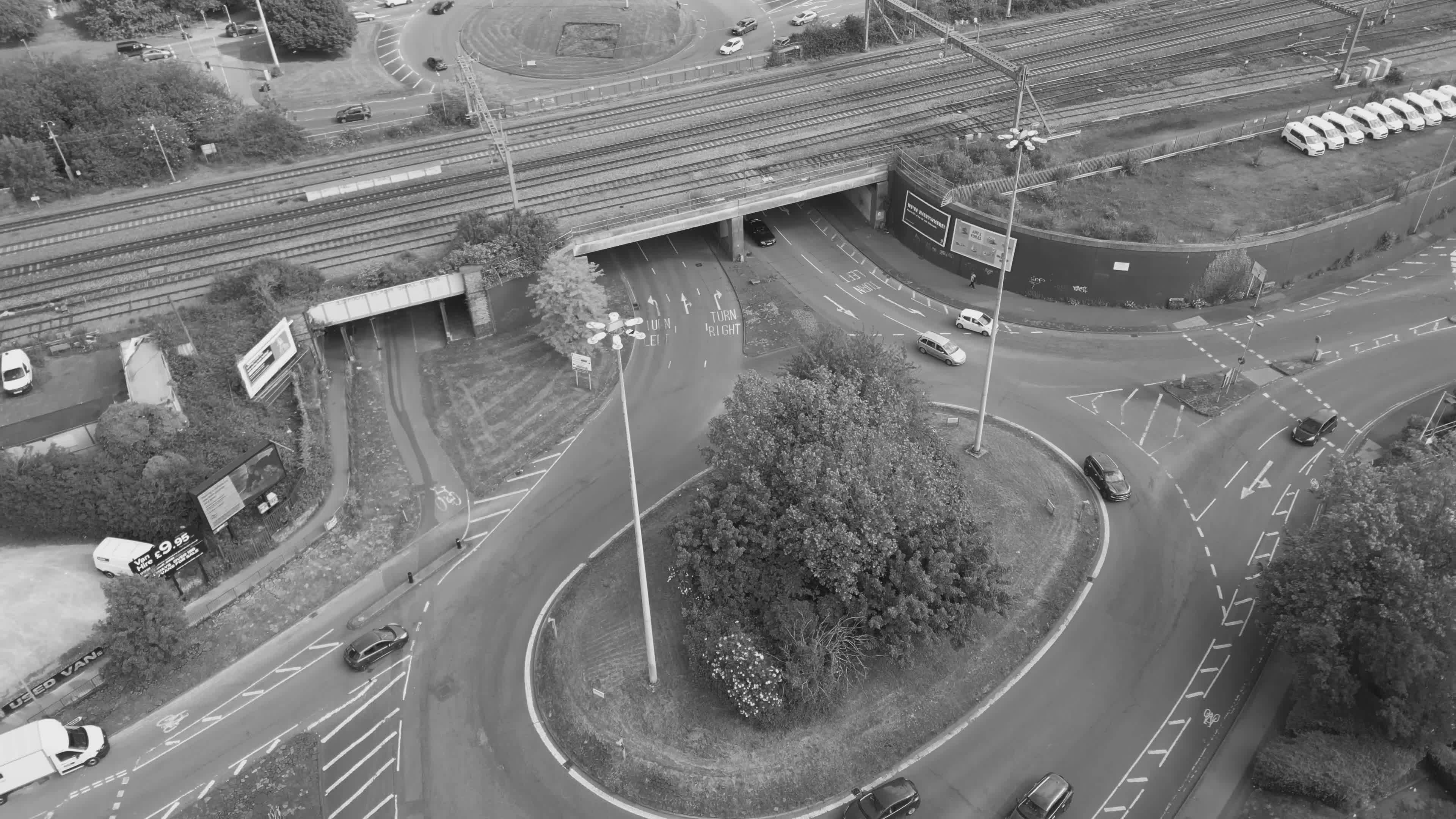 Aerial View of Busy Urban Roundabout Traffic Free Stock Video Footage ...