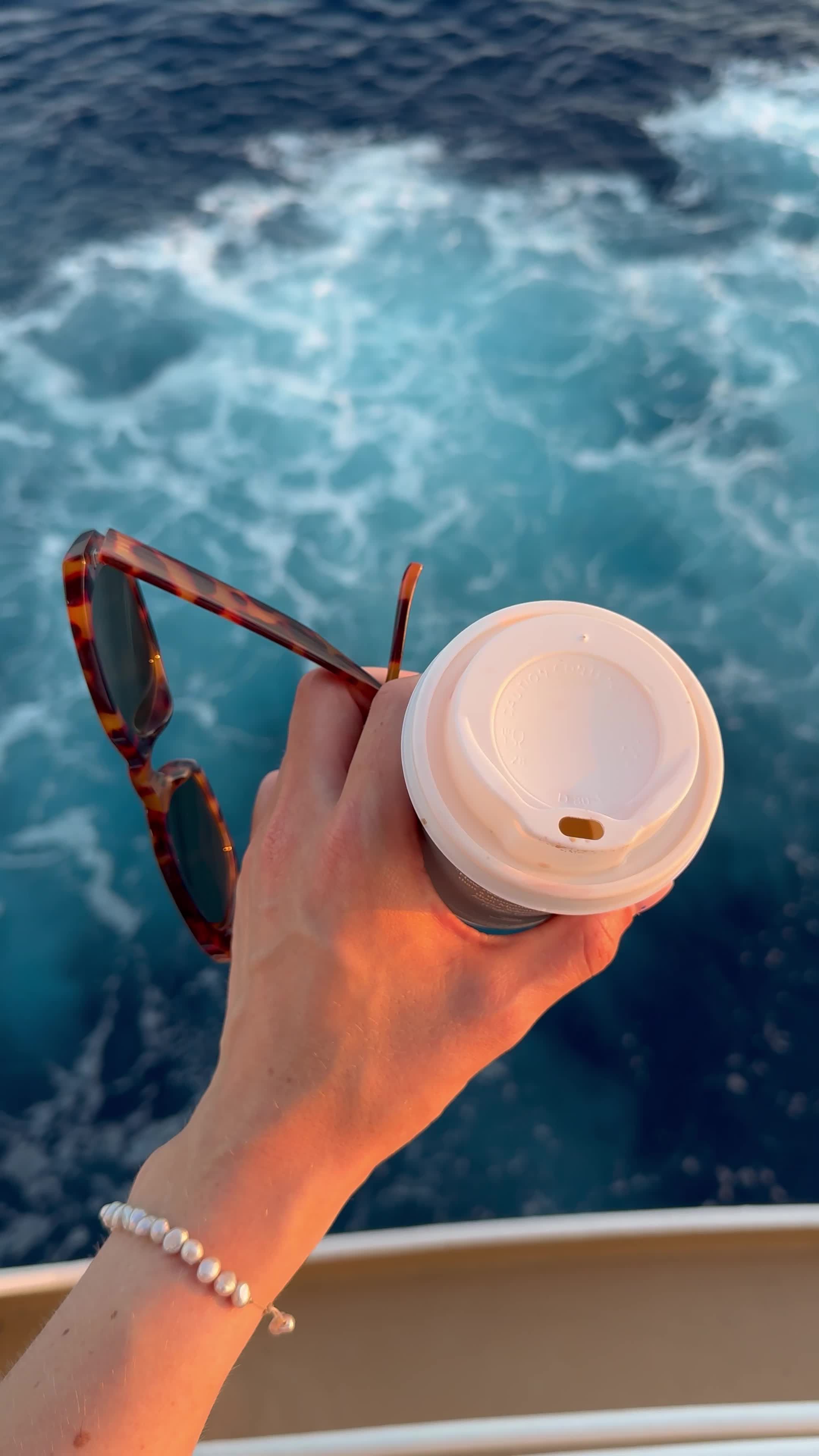 Hand Holding Coffee Cup Over Ocean View Free Stock Video Footage ...
