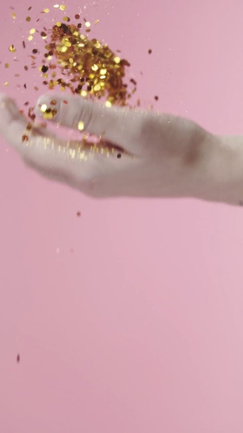 Glitters On Person's Hand