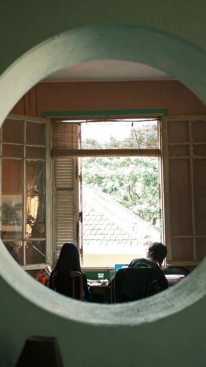 Casual Workspace with Two People by Window Free Stock Video Footage ...