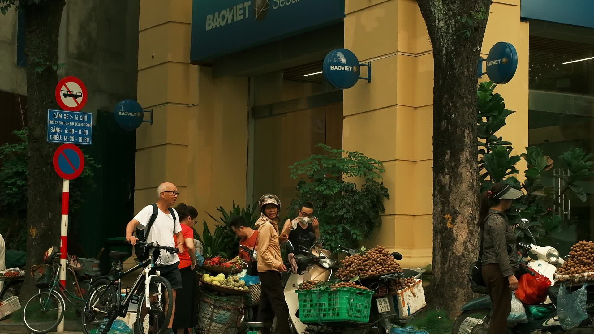 urban street life in hanoi s bustling market 34056867 — free pexels stock footage