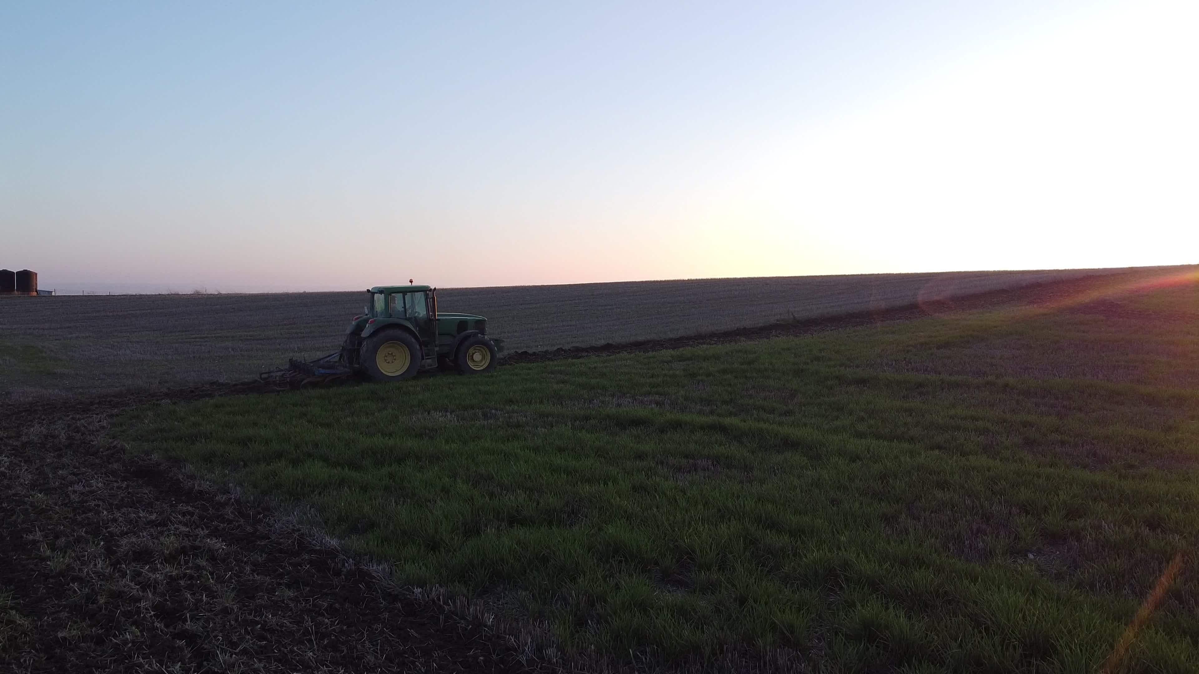 Sunset Tractor Plowing Field in Rural Landscape Free Stock Video ...